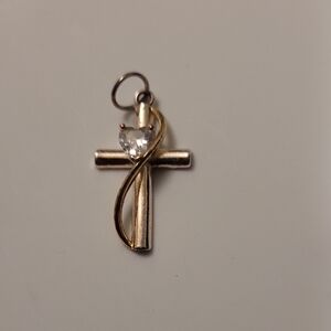 Elegant Gold and Silver Cross Pendant
